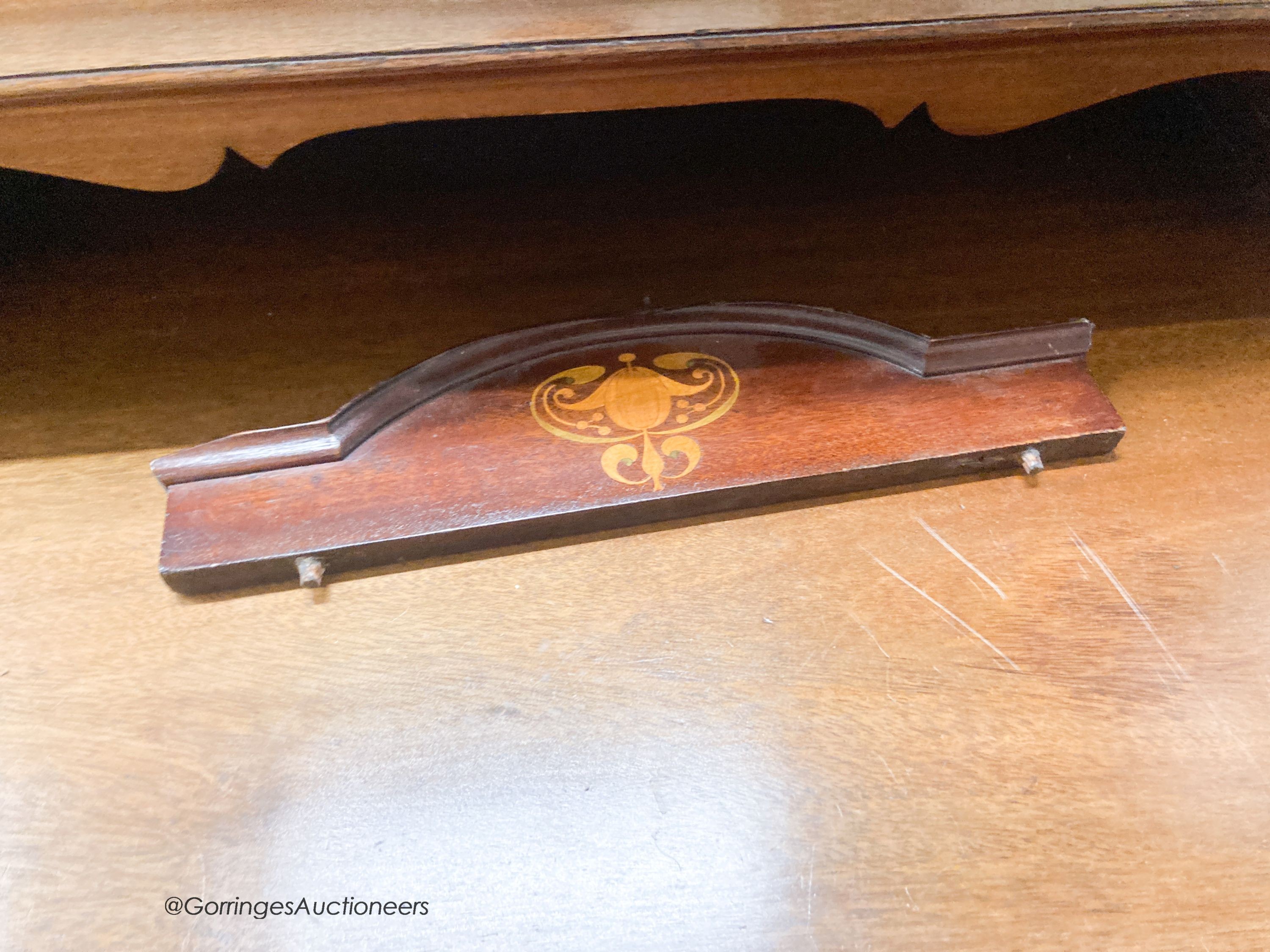 An Edwardian Art Nouveau inlaid mahogany dressing chest, width 122cm, depth 55cm, height 160cm